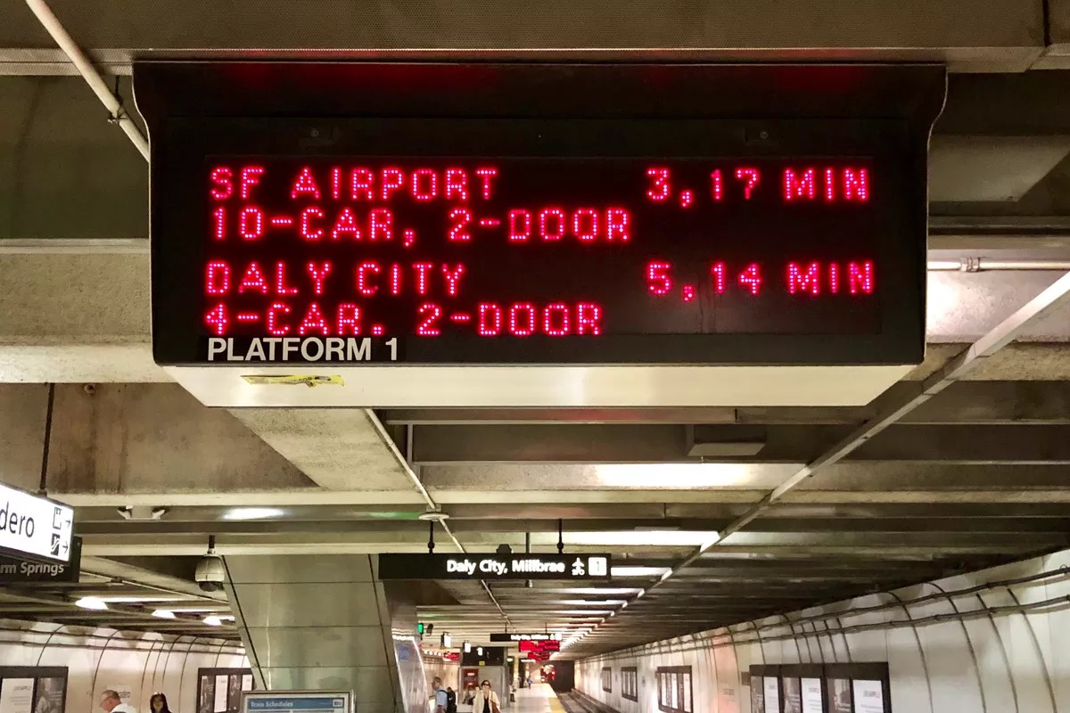 BART platform sign showing train ETAs